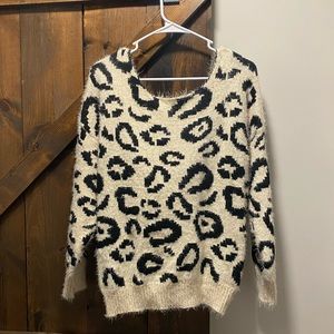 Leopard print knotted back sweater